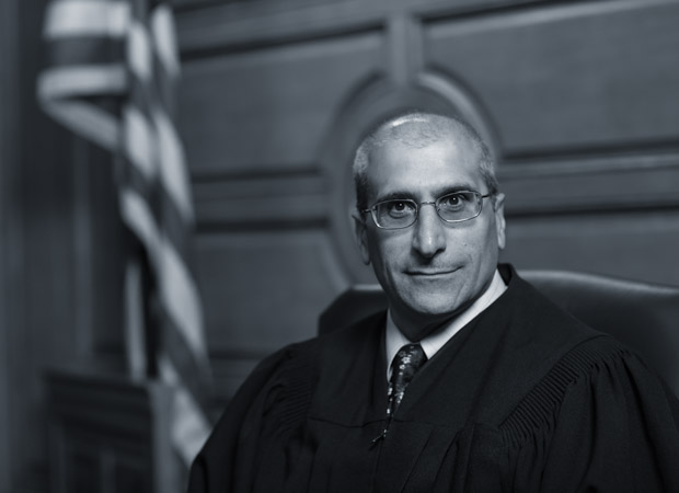 Justice Gaziano sitting in his judges robes