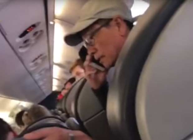 People sitting on a United Airlines plane