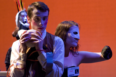 Actors playing Hansel and Gretel with masks 