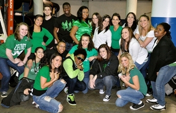 Group photo of wicked dance crew with most wearing green