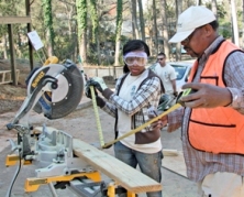 Workers doing woodcutting
