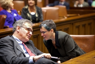Two people talking in court