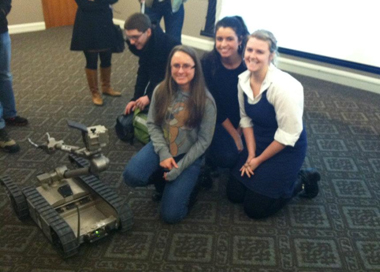 Students with a robot