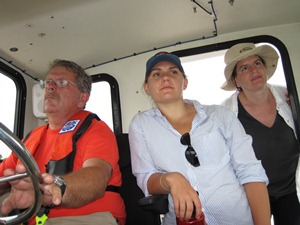 Briana McDowell and 2 researchers in a boat