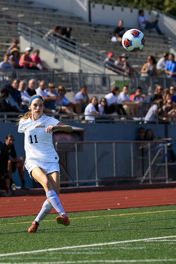 A Suffolk student playing soccer