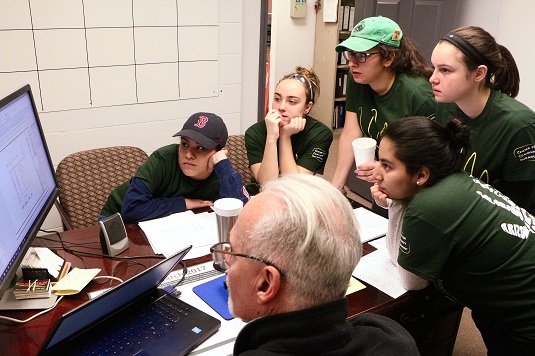 Students join Gerry Gardetto, senior site manager for Habitat for Humanity 