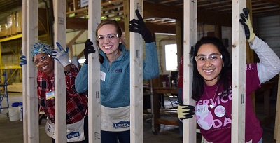 Two students volunteers working at the site