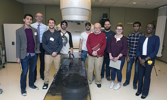 Mario Rojas '18, Dr. David Gierga, Paul Johnson '18, Jackson Nolan '19, Erick Bergstrom '19, Professor Walter Johnson, Jack Thomas '19, Molly McDonough '21, Allen Alfadhel '18, and Jacky Nyamwanda at Massachusetts General Hospital's Department of Radiation Oncology 