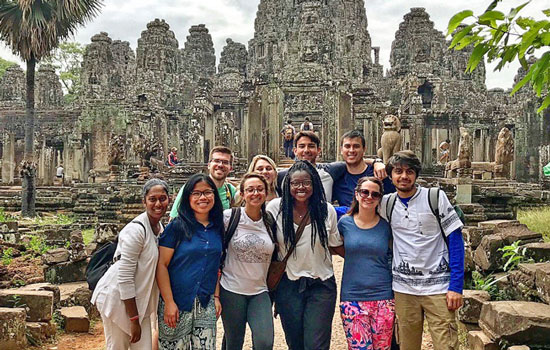 Students visit the Angkor Wat temple complex in Cambodia.