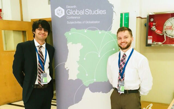 Joshua Weissman LaFrance and Yash Patel in Granada, Spain to present their research.
