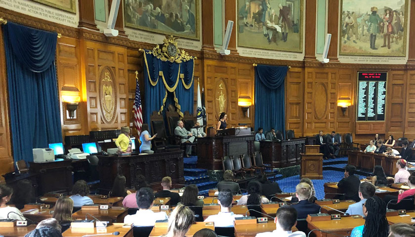 Anna Duffy introduces the speaker in the MA House of Representatives