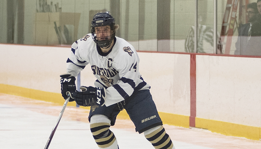 Mikhail Bryan in Rams uniform on the ice