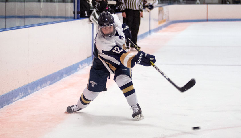 Haley Poloskey with the puck