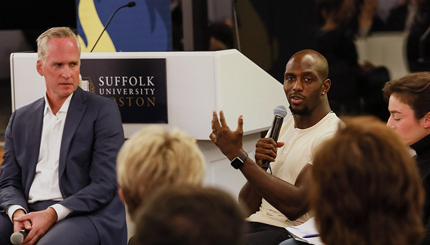Devin McCourty gestures as he speaks during forum