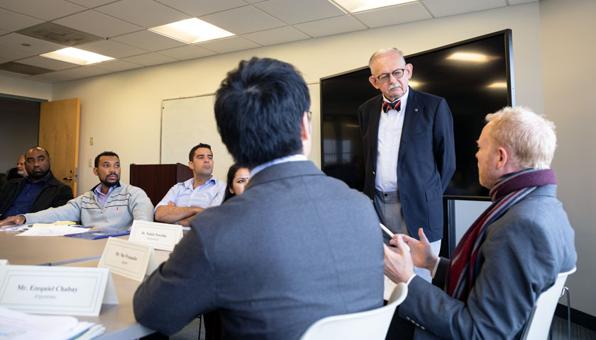 Professor Ronald Suleski speaks to the international delegation