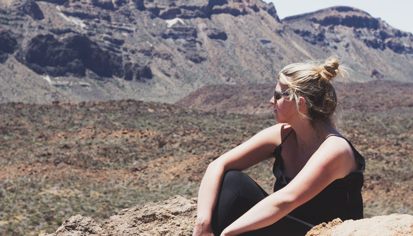 McDonough sits outside in the Canary Islands