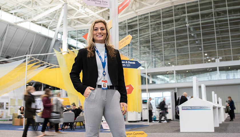 Talia Riccioli, Class of 2020, on the floor of the BCEC