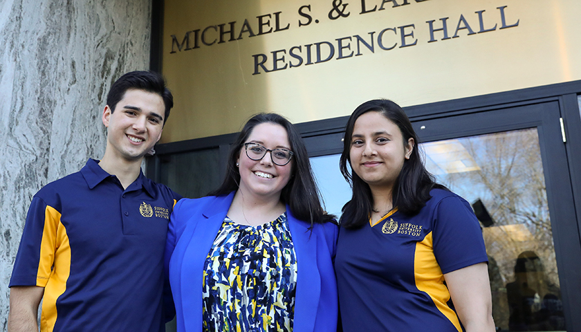 Andres Rodriguez,  Danielle Remigio, and Aashi Sethi in front of Smith Residence Hall