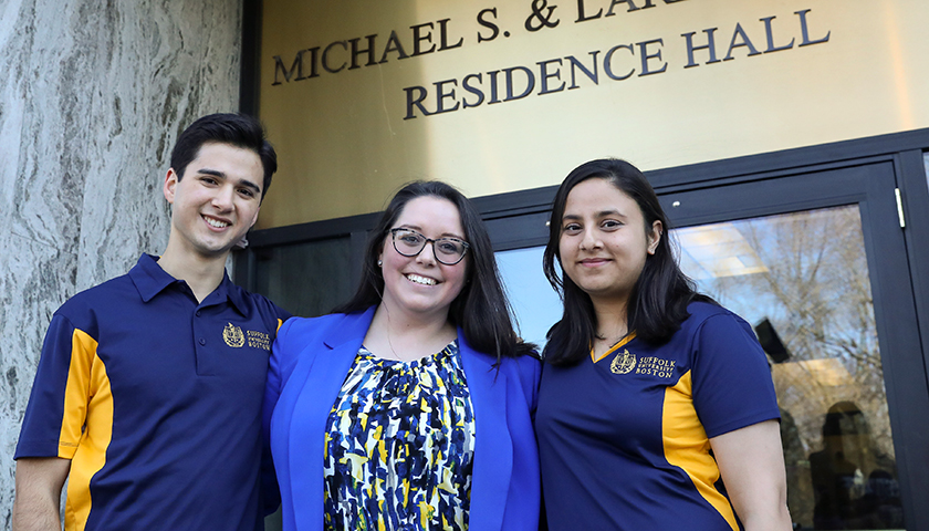 Andres Rodriguez, Danielle Remigio, and Aashi Sethi in front of Smith Residence Hall