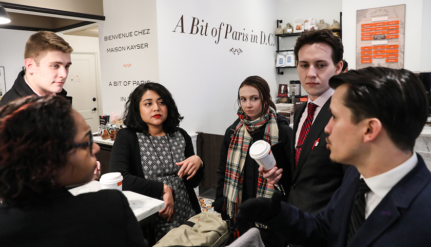 Discussion continues as students stop at coffee shop