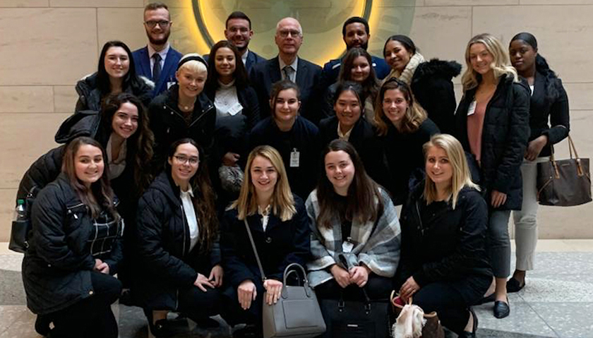 Group photo of Suffolk students at IMF
