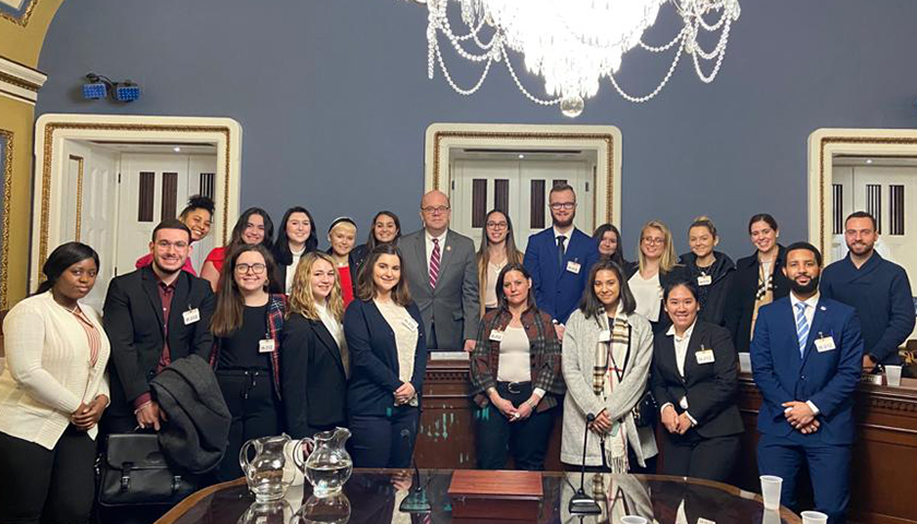 Suffolk group with Congressman Jim McGovern in ornate room