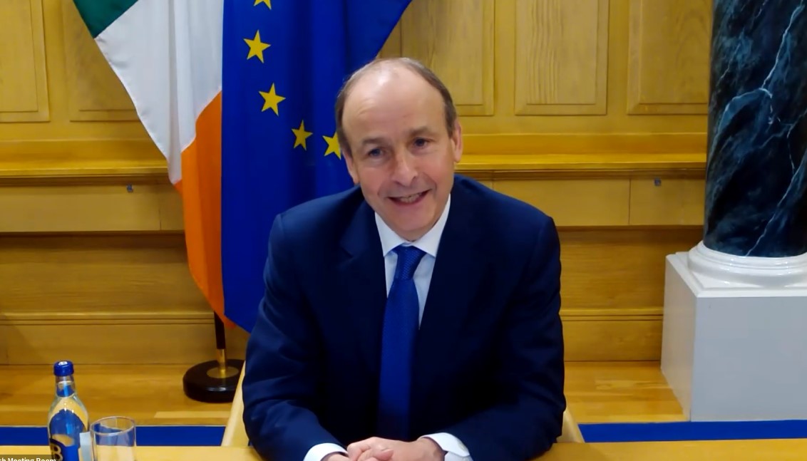 Zoom screenshot of Irish Taoiseach Michael Martin seated in front of the Irish flag