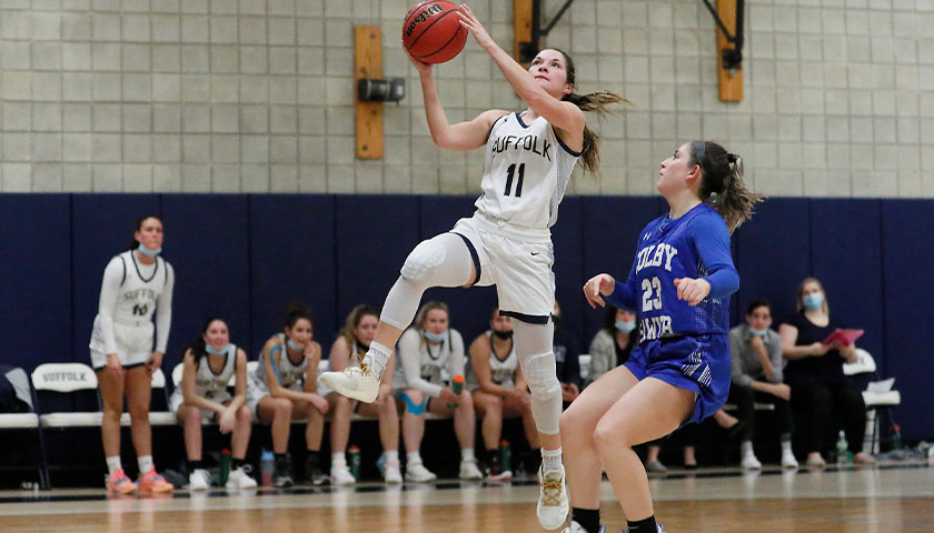 Jenni-Rose DiCecco goes in for a jump shot against a Colby-Sawyer player