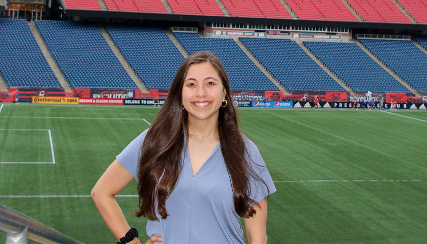 Hannah Arroyo standing on the field at Gillette Stadium