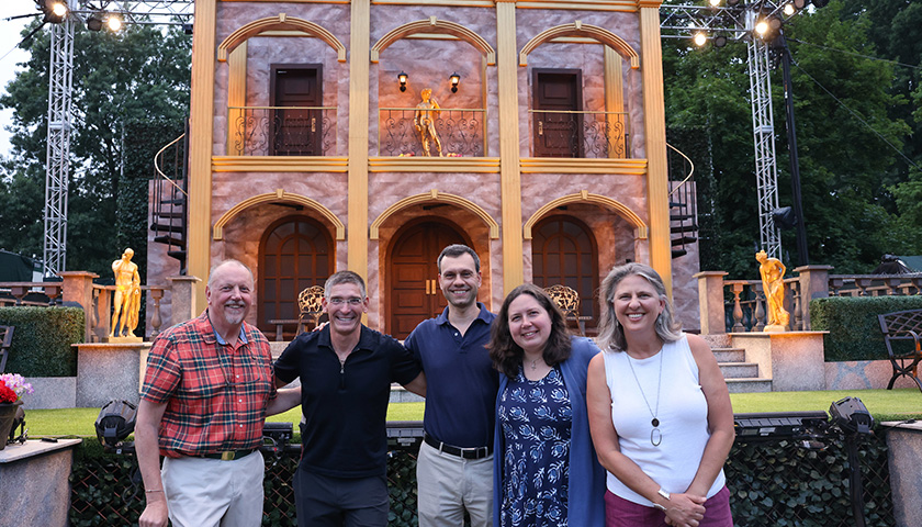 In front of the stage at "Much Ado About Nothing" on the Boston Common: Left to right: Suffolk University Theatre Department Chair Richard W. Chambers, CSC Founding Artistic Director Steven Maler, CSC Board Member Dave Friedman, Boston City Councilor Kenzie Bok, and CAS Dean Dr. Edie Sparks