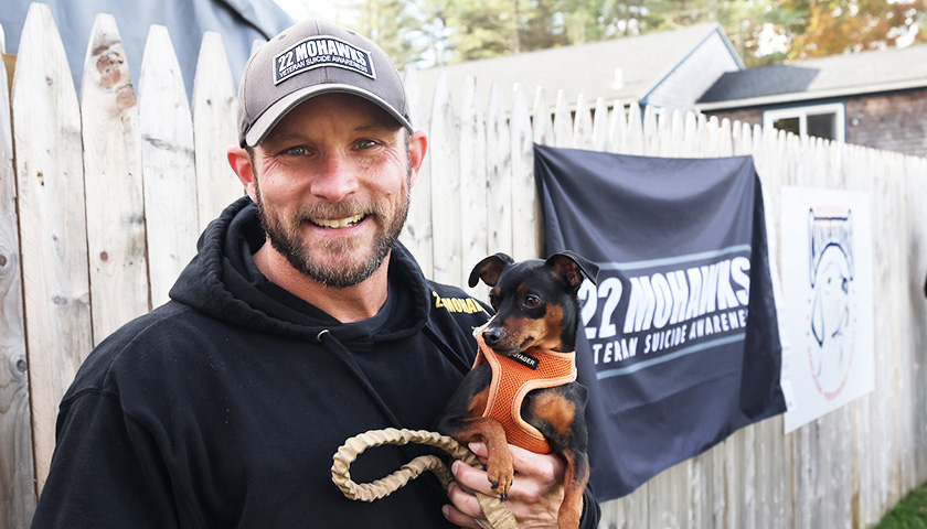 22Mohawks founder David Campisano, BSBA '19, with one of his little canine friends