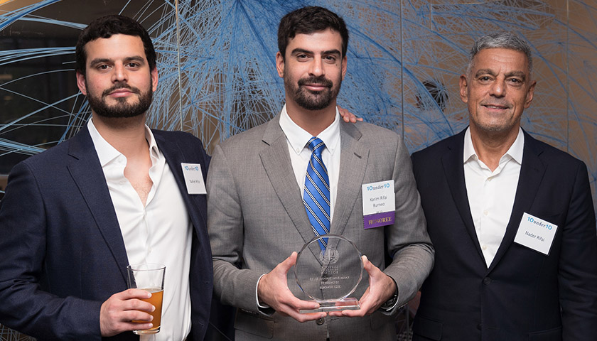 Karim Rifai (center) with his brother, Nahel, and father, Nader