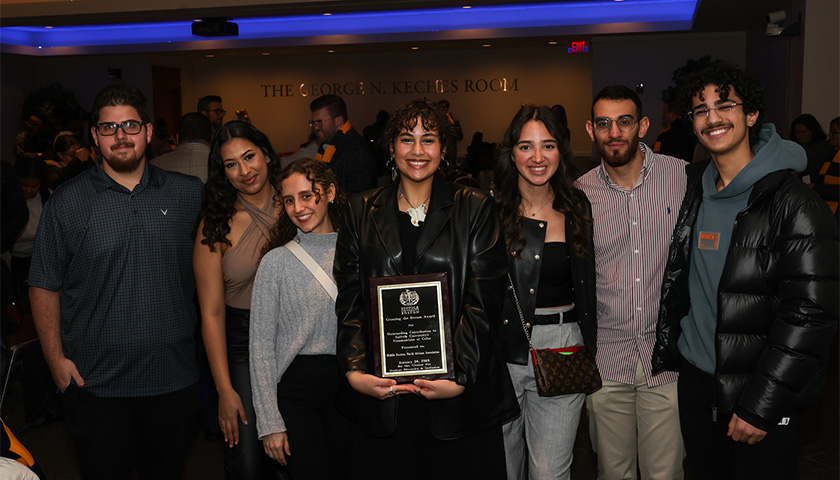 Members of the Middle Eastern North African Association accept their Creating the Dream Award: Marco Sukkar, Maryam Alsobhi, Maya Alaoeasheg, Reema Fayez, Angela Al Jazzar, Mohammed Ammar, Sultan A. Alkhedheiri