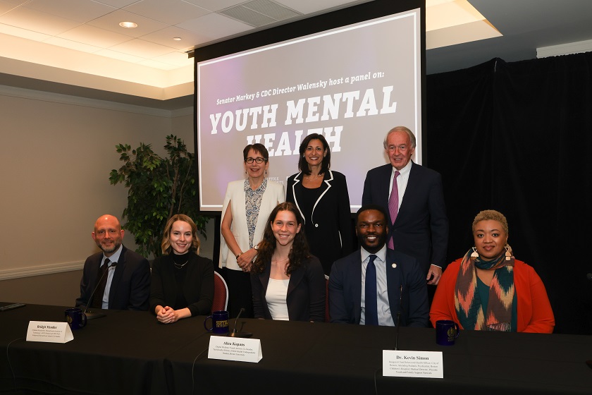 Panelists for May 12 panel on Youth Mental Health pose with President Kelly