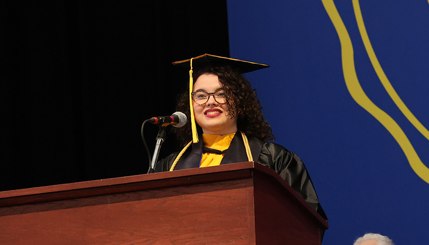 Chelsea Daigle giving the undergraduate greetings at her commencement