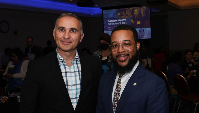 Suffolk VP Boris Lazic and Segun Idowu, chief of economic opportunity and inclusion for the City of Boston