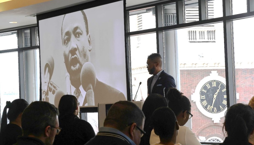 Keynote speaker Imari Paris Jeffries, executive director of Embrace Boston, addressed the crowd assembled for the 2024 Martin Luther King, Jr. Celebration and “Creating the Dream” Awards Ceremony in Smith Commons