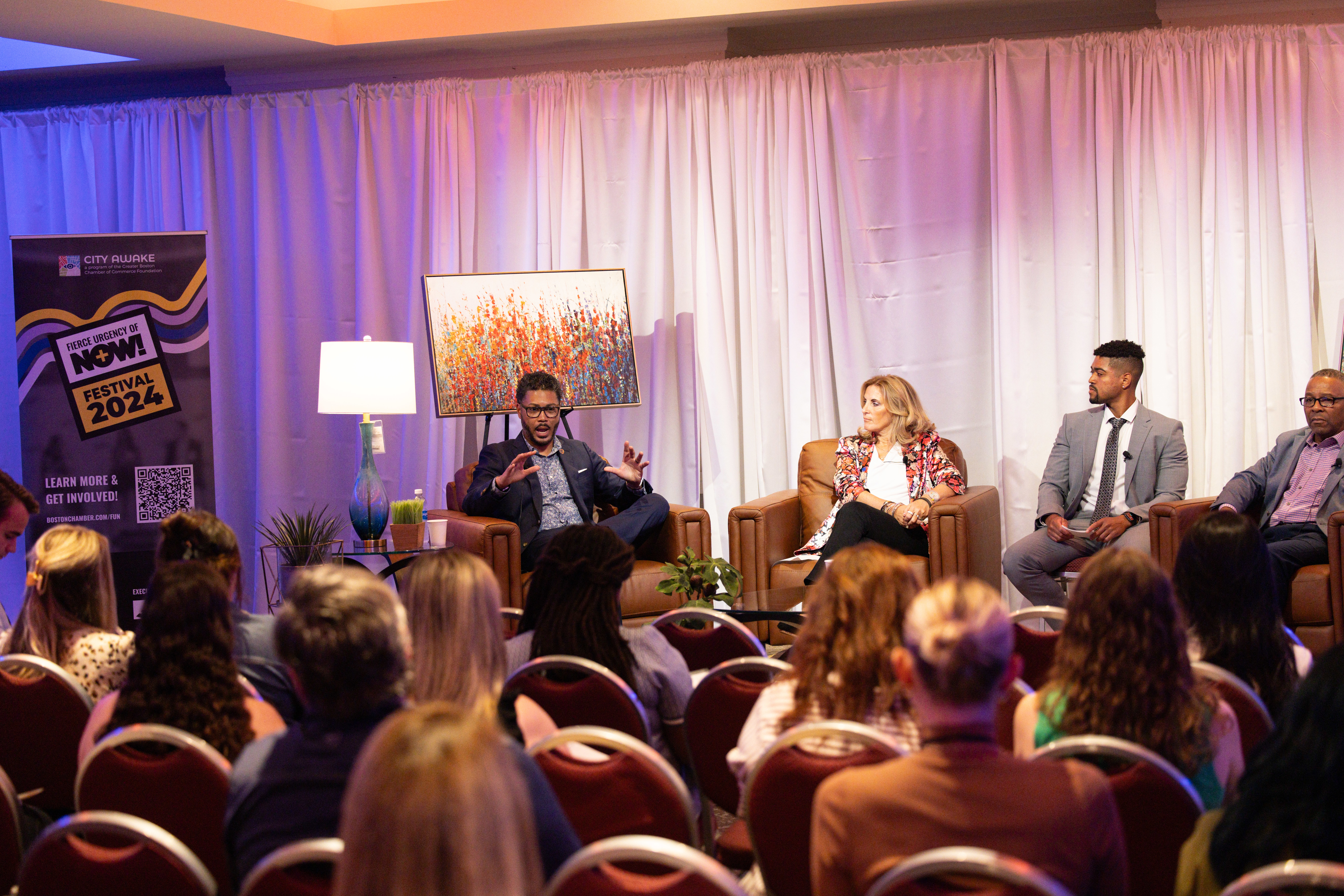Panel speakers discuss allyship and networking at the opening session of the Fierce Urgency of Now Festival at Suffolk University.