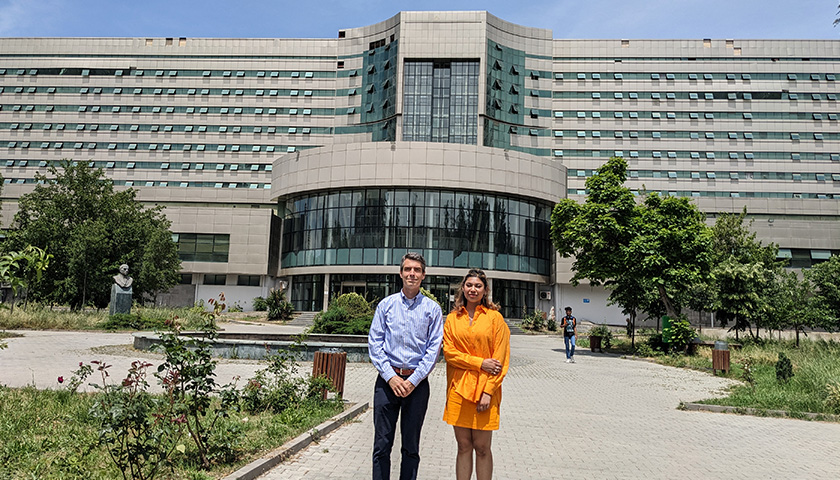 Professor Peter Martelli and graduate student Shagorika Dé outside the Republican Hospital in Tblisi