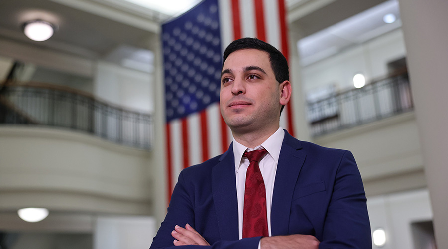 Omar Hajajra standing in the lobby of Sargent Hall