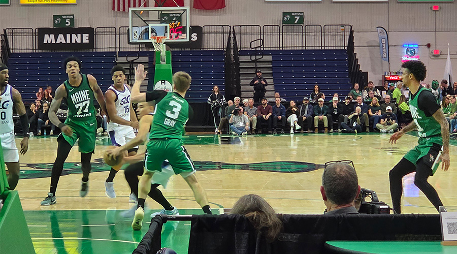 Maine Celtics in green uniforms doing their thing on the court in Portland, Maine
