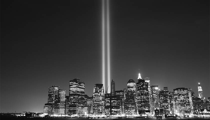 Lower Manhattan with two twin vertical beams of light where the World Trade Center would have stood