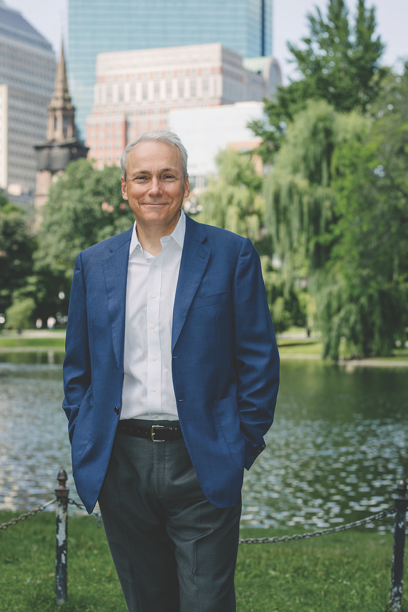 Tim Phillips, BS ’83, HDHL ’18, poses for a photo in the Boston Gardens.