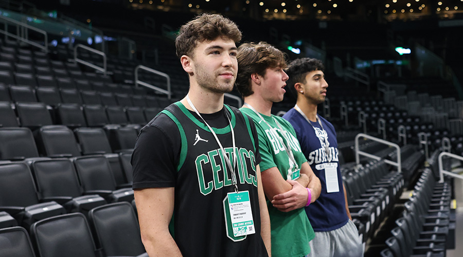 Suffolk Sports Management students courtside in Boston's TD Garden with the Celtics