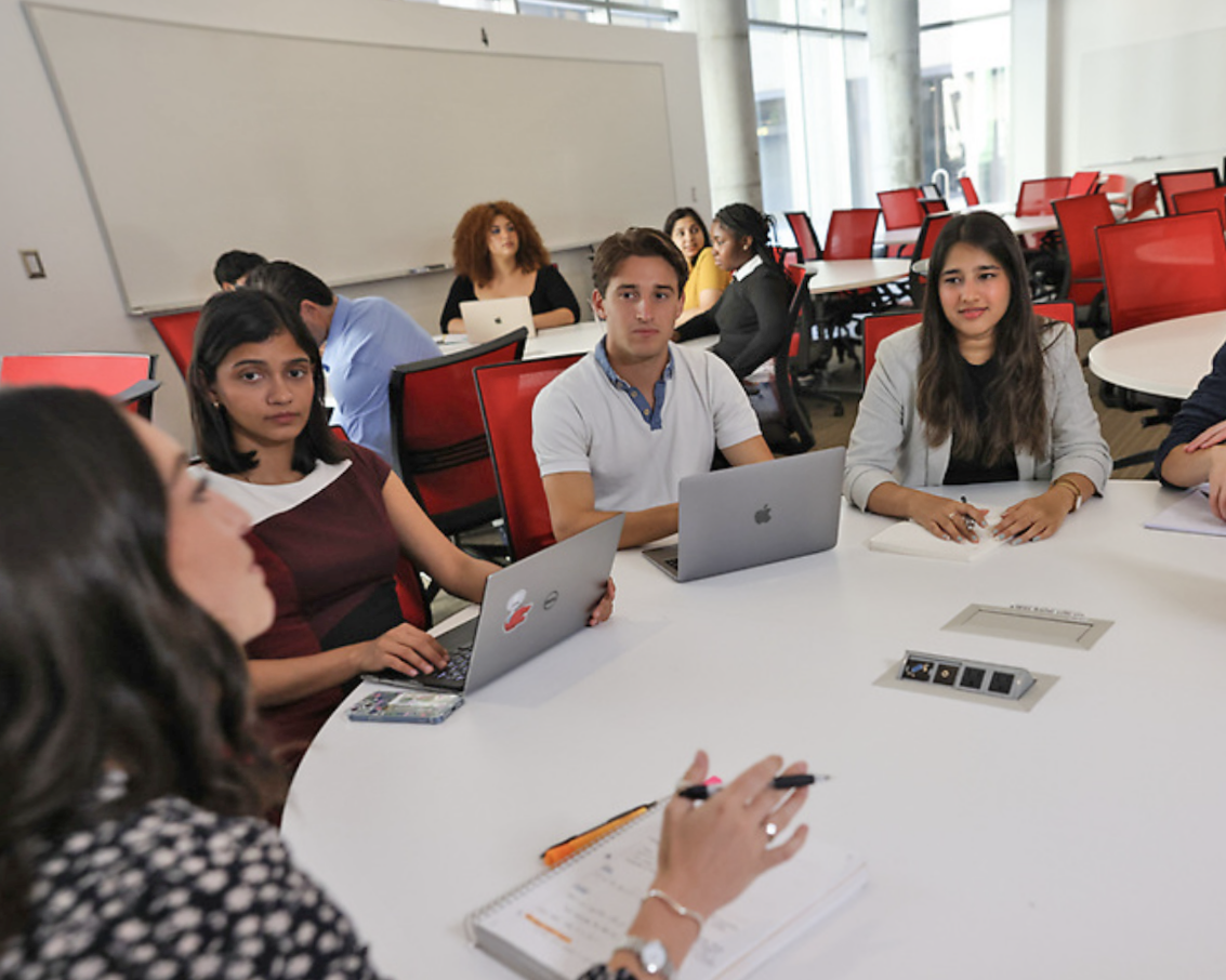 Students sitting around a table