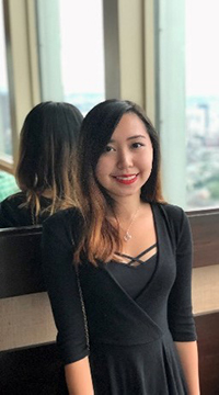 Headshot of May Yi Jennifer Chua.