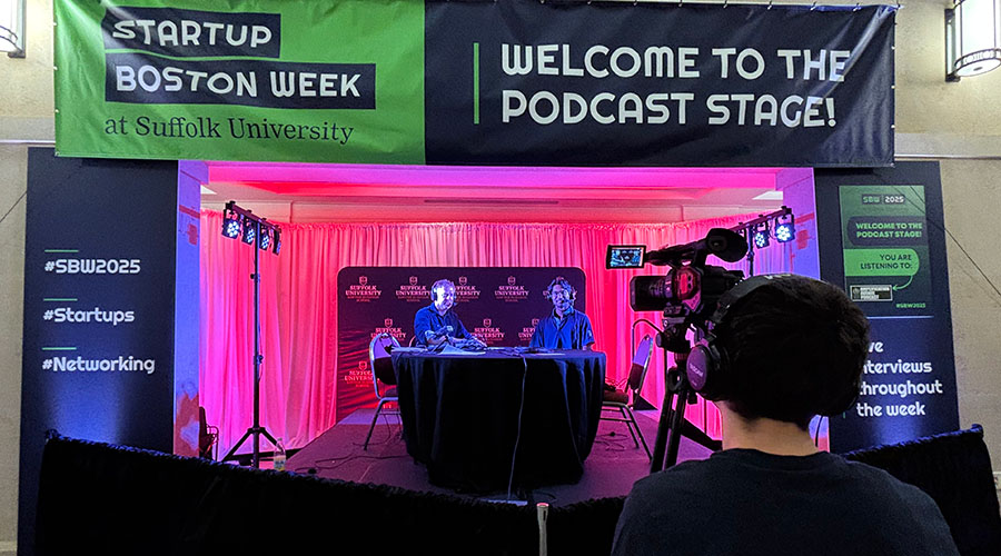 Professor Skip Perham, director of our sports management program, records a podcast with alumnus Vijay Sakuru, BSBA '25, during Startup Boston Week