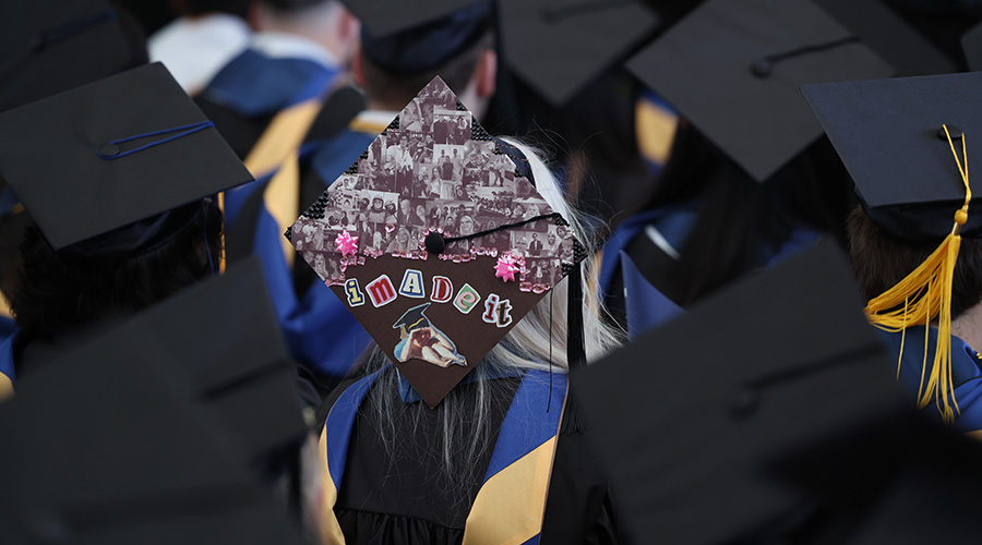 A Business School student's cap decorated with "I made it!" at Commencement.