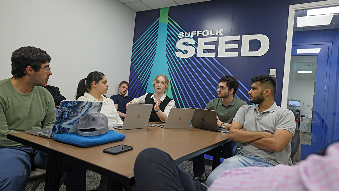 A Suffolk student speaks during a SEED small group.