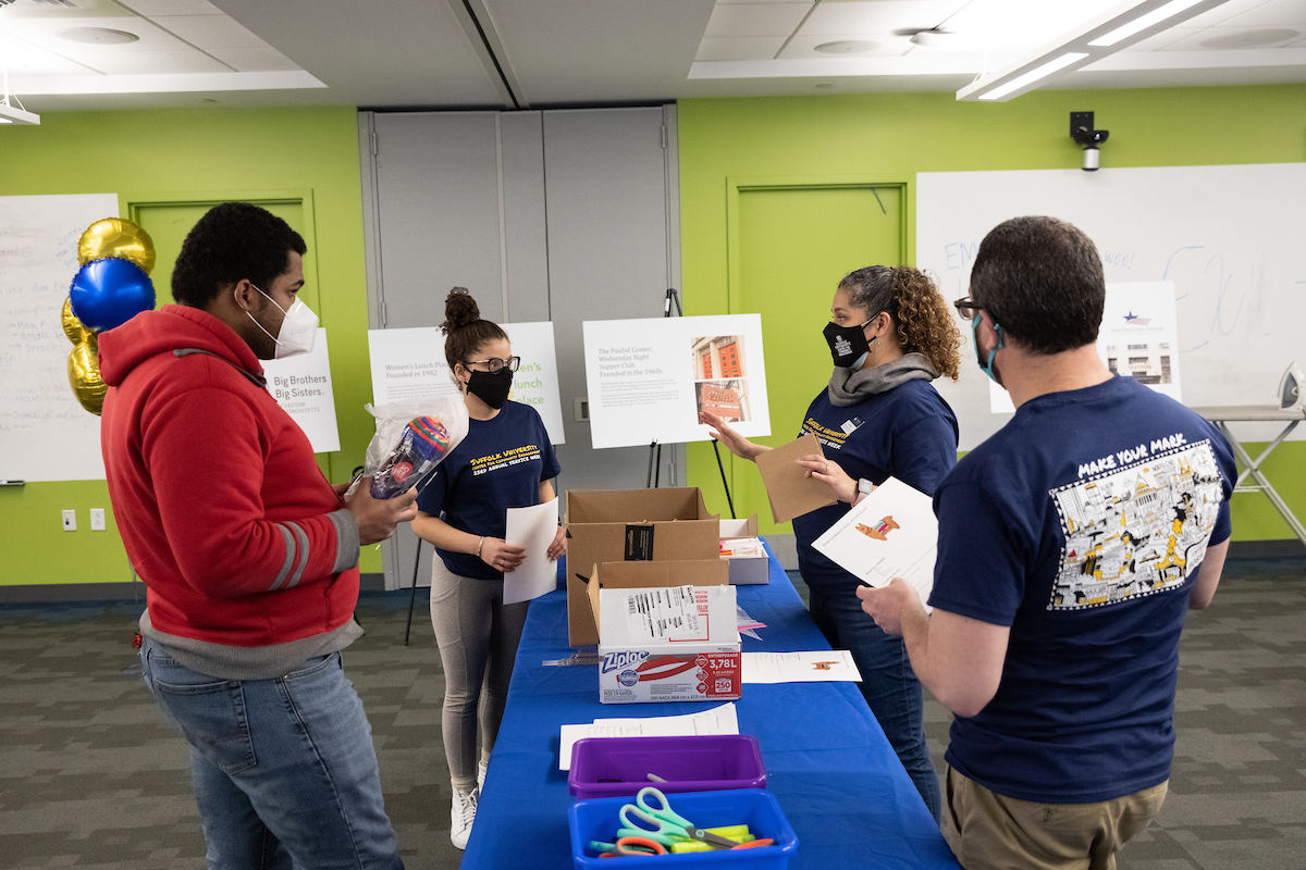 A group of volunteers during Suffolk's Service Week at an event